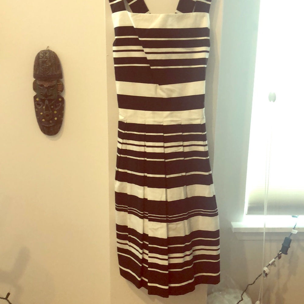 Pleated sleeveless dress with cross strap back